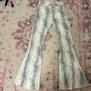 SNAKE PRINT DENIM FLARED PANTS